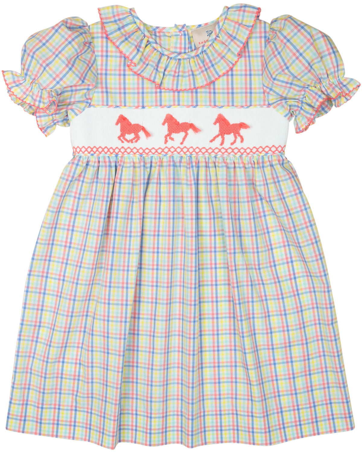 Colorful checkered dress with horse design on a white background