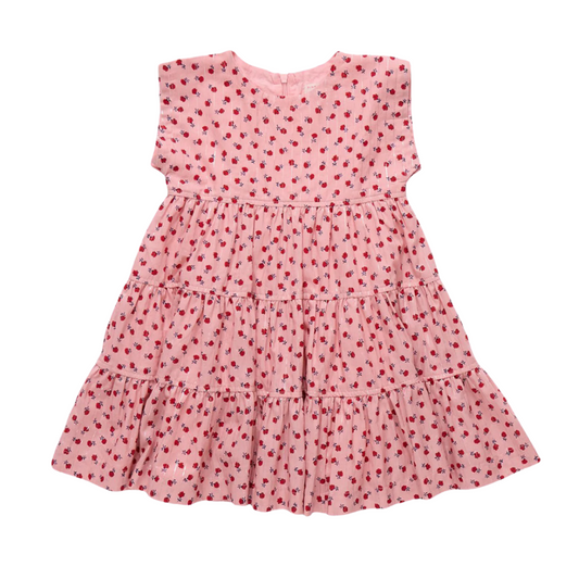 Pink autumn dress with red floral pattern on a pink background