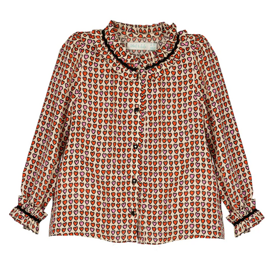 girls white blouse with pink and red hearts and neck and cuff ruffles lined in black