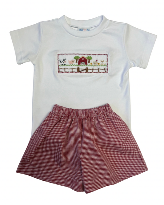Children's outfit with a white shirt  with smocked farm scene and red checkered gingham shorts 