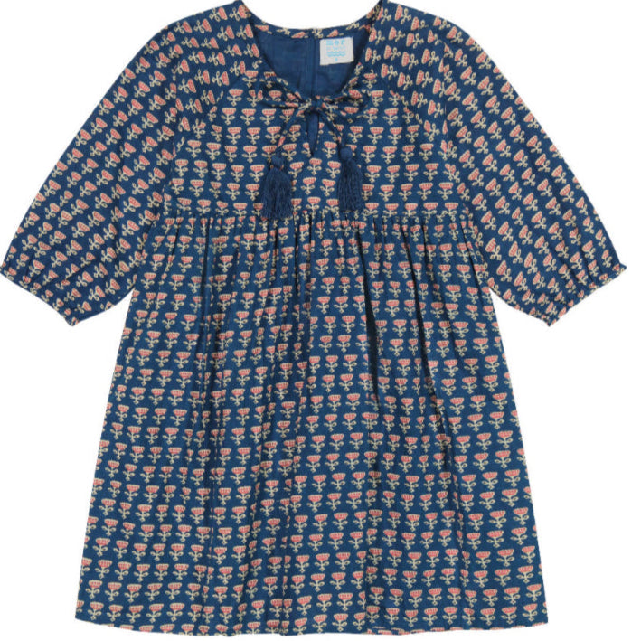 navy empire dress with block print floral pattern with tassels