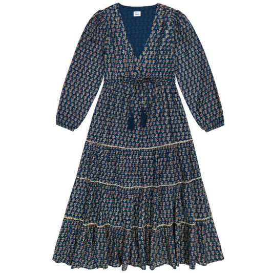 Long-sleeve navy dress with an orange tan pattern and tassels