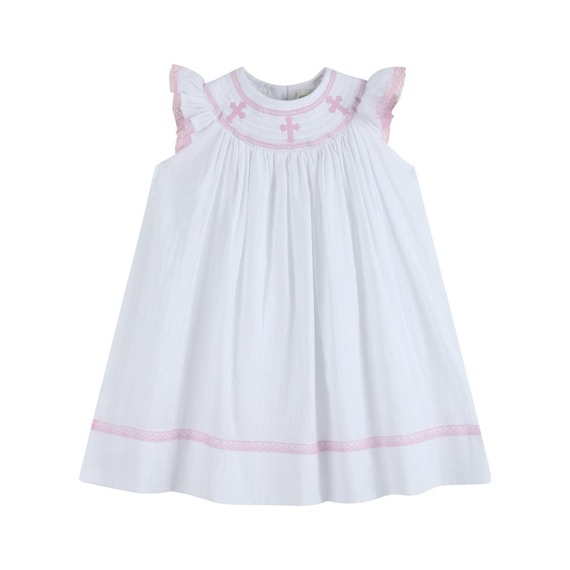 girls white bishop dress with pink crosses smocked at the neckline and light pink details