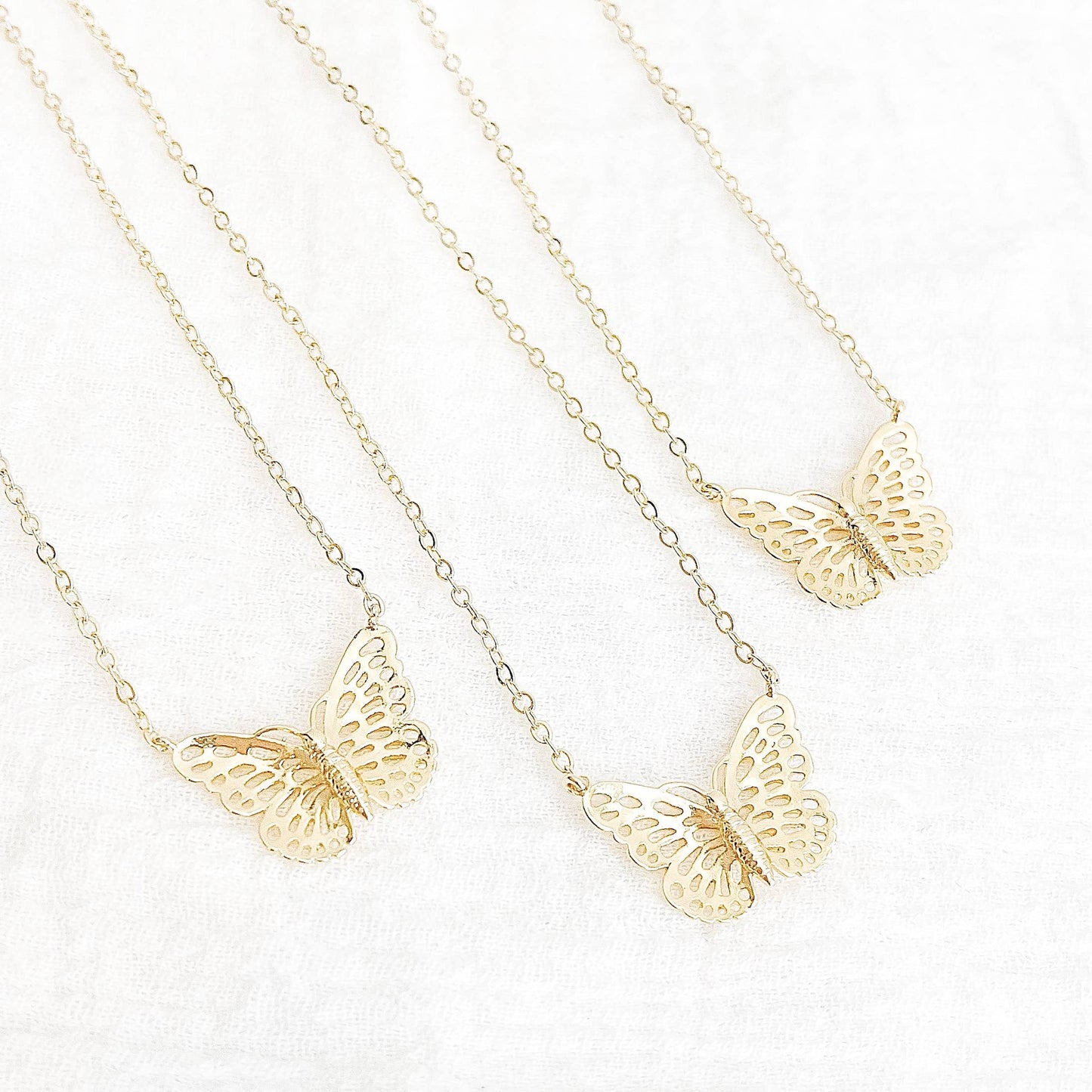 wrapped by sav gold butterfly necklace